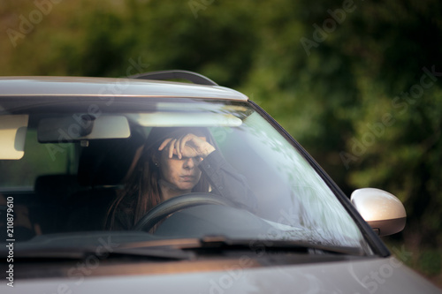 Stressed Female Driver on a Summer Vacation Road Trip © nicoletaionescu