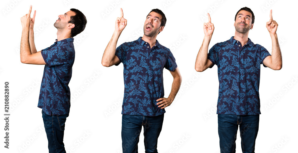 Obraz premium Set of Brunette man pointing up
