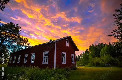 Old Finnish house in summer night. Photo from Sotkamo, Finland.