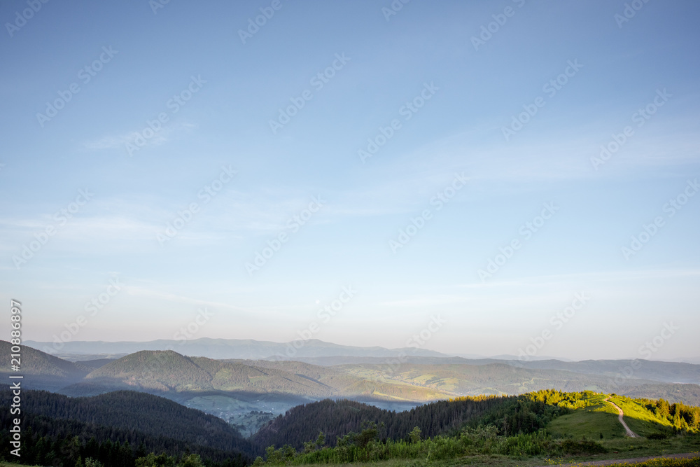 Landscape view on the beautiful Carpathian mountains on the High Top near the Slavske village during the sunrise in Ukraine