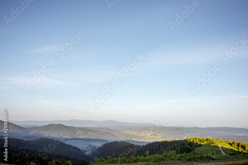 Landscape view on the beautiful Carpathian mountains on the High Top near the Slavske village during the sunrise in Ukraine