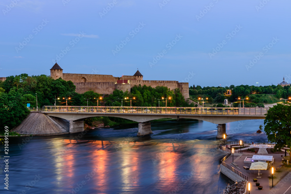 The ancient Russian fortress in Ivangorod, the monument and popular tourist attraction on the border with Estonia, beautiful night view, Ivangorod town, Russia