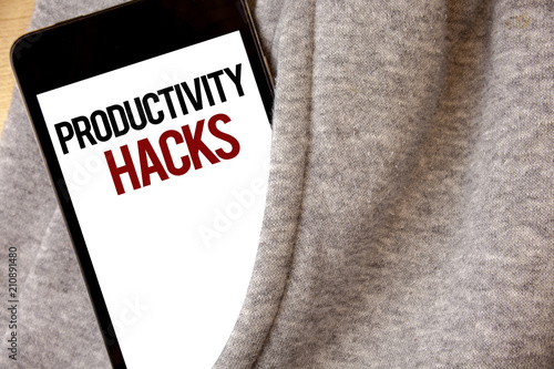 Handwriting text writing Productivity Hacks. Concept meaning Hacking Solution Method Tips Efficiency Productivity Hoar frost color side pocket cell phone be visible black and red letters.