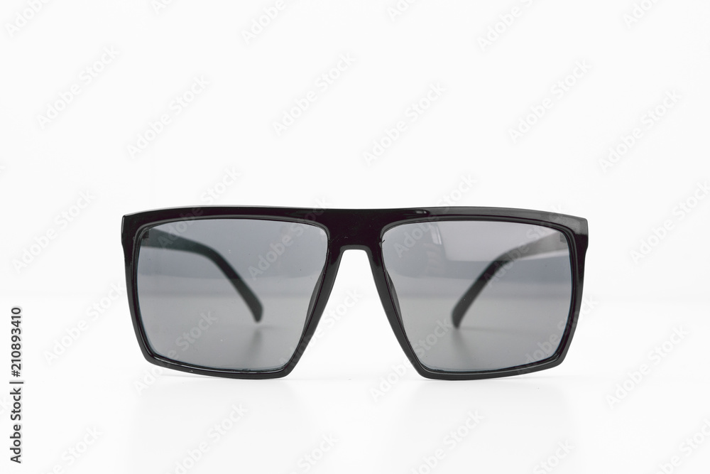 Black Elegant Sunglasses Close Up On White Background With Lens Reflections Eyewear Concept