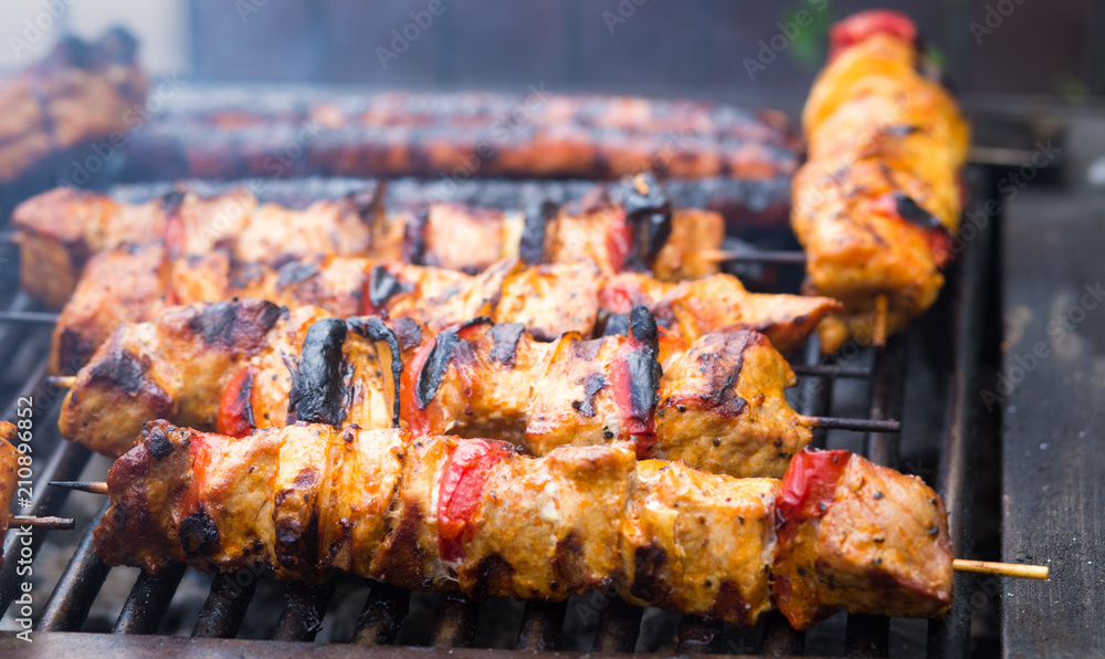 Barbeque. Skewers of meat with vegetables 
