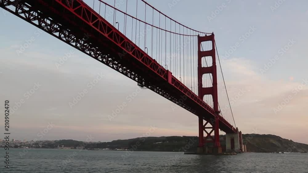 Crossing Under the Golden Gate Bridge during Evening Crossing Under the Golden Gate Bridge during Evening