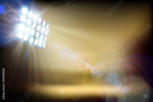 Stage in the stadium illuminated by floodlights. Abstract vector illustration.