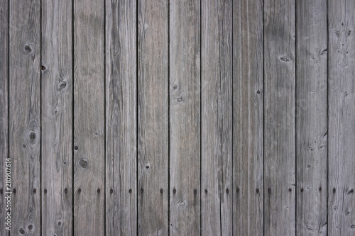 vertical wooden planks with screws