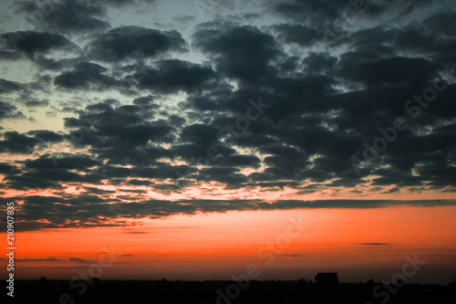 Red sunset and textured clouds