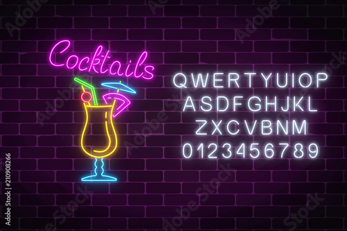 Glow neon sign of cocktails bar with alphabet. Glowing gas advertising with pina colada alcohol shake.