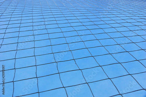 grid at the stadium against the blue sky.