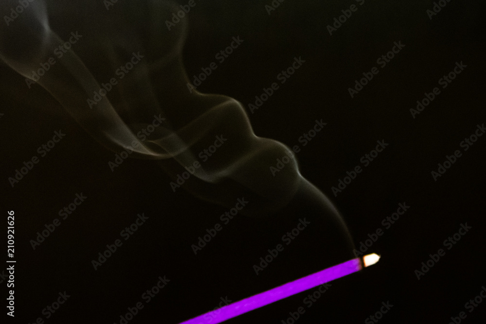 mystery dense blue smoke over dark background, abstract photo mystery dense blue smoke over dark background, abstract photo