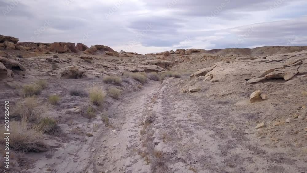 Flying low through desert ravine over rocky terrain in Utah. Flying low through desert ravine over rocky terrain in Utah.