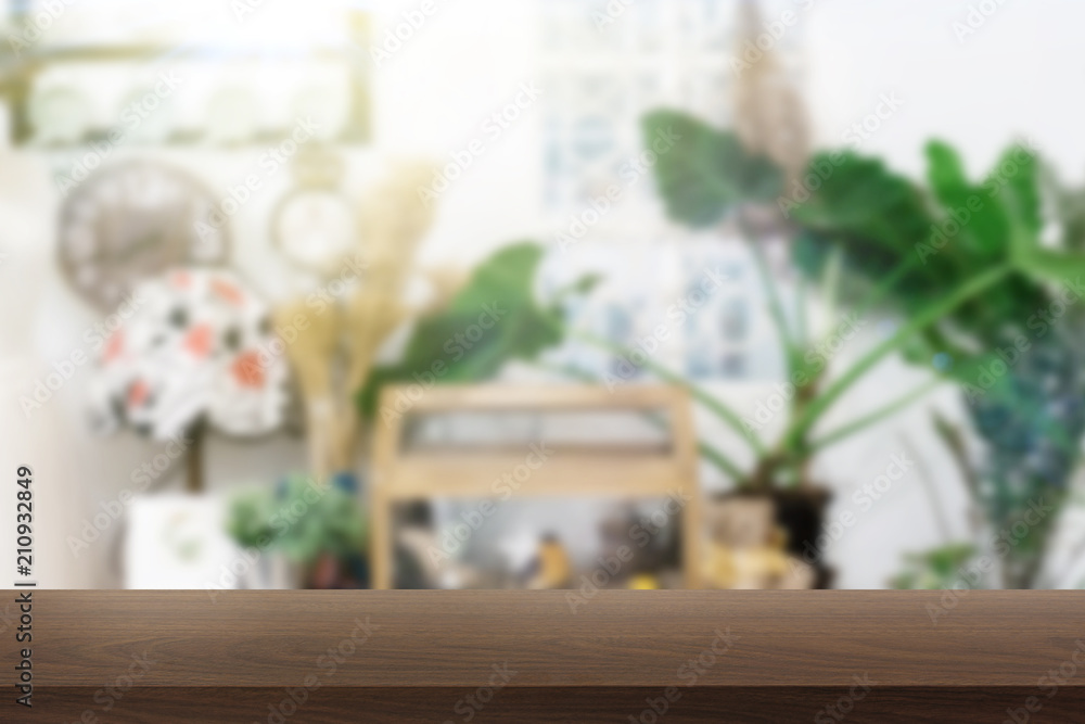 Empty wood table in front of blurred workplace background. Empty wood table in front of blurred workplace background.