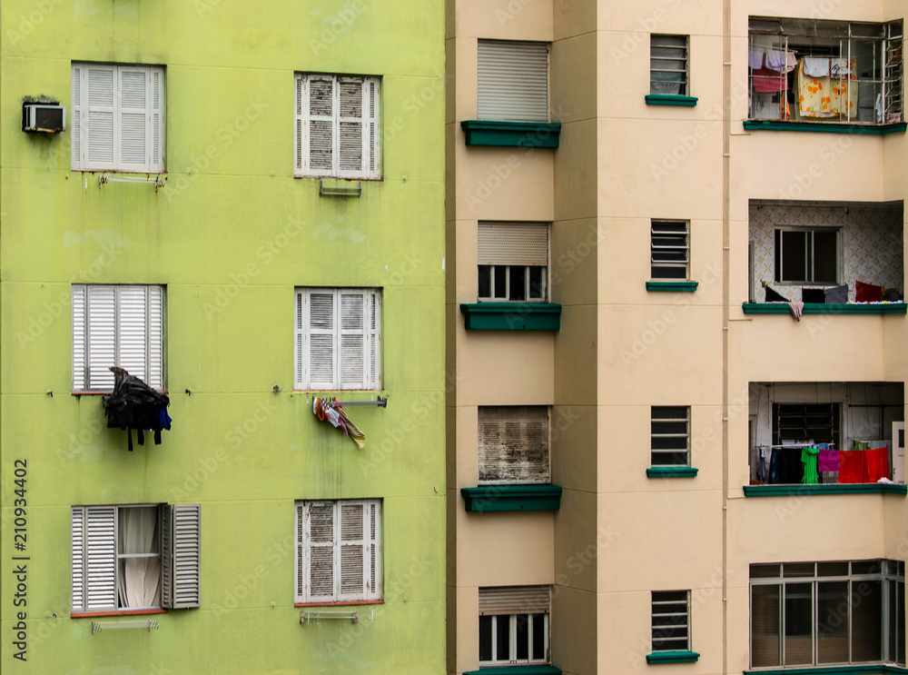 Obraz premium Old vintage apartment building blocks, windows pattern