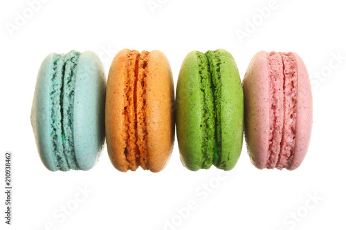 colored macaroons isolated on white background without a shadow closeup. Top view. Flat lay photo