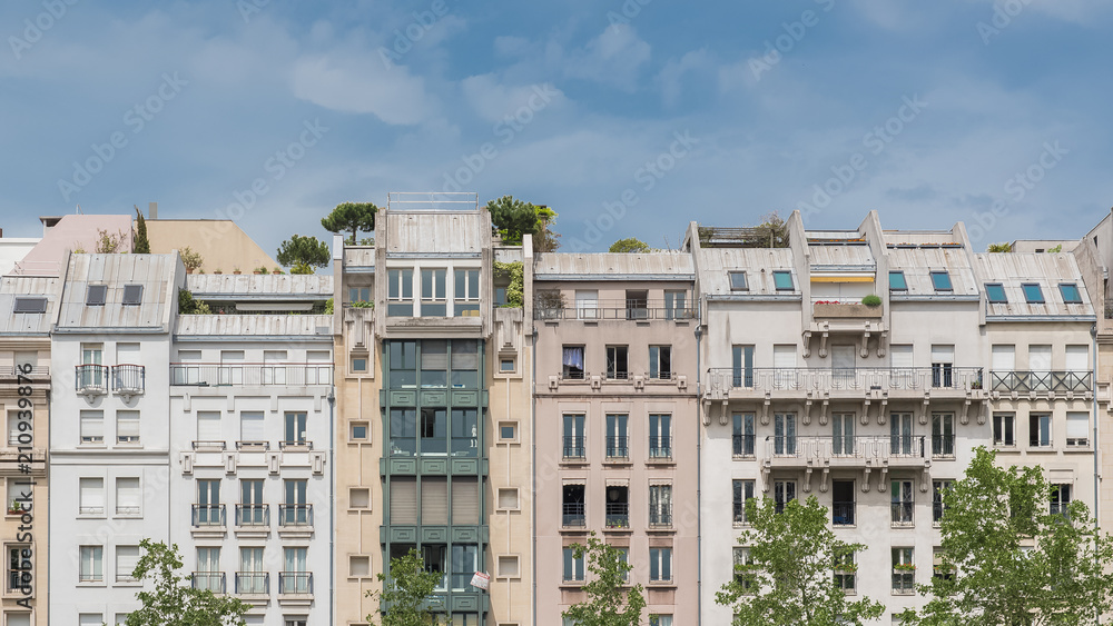 Paris, beautiful buildings, typical parisian facades in the Marais
Paris, beautiful buildings, typical parisian facades in the Marais