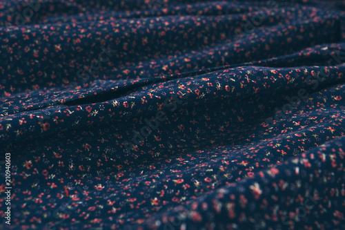 fabric texture as background. Blue flax. Item of clothing close-up photo