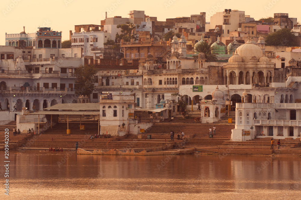 PUSHKAR, INDIA - OCTOBER 10, 2010: Sunset at sacred Pushkar city PUSHKAR, INDIA - OCTOBER 10, 2010: Sunset at sacred Pushkar city