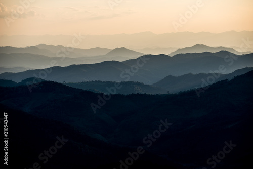 Beautiful landscape layer of mountains in sunset time, North of THAILAND