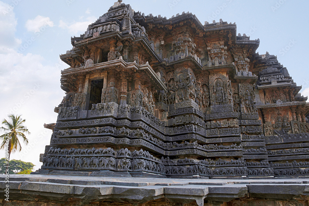 Naklejka premium Facade and ornate wall panel relief, Hoysaleshwara temple, Halebidu, Karnataka View from South West.