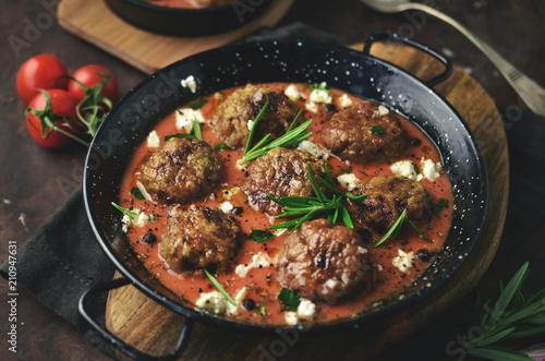Meatballs in sweet and sour tomato sauce. 