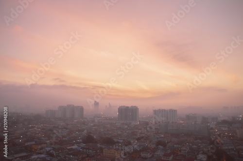 Aerial panorama at orange sunrise of Petaling Jaya, suburb of Kuala Lumpur, Malaysia