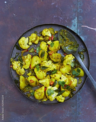 Allo ghobi (cauliflower curry with potatoes, India) photo