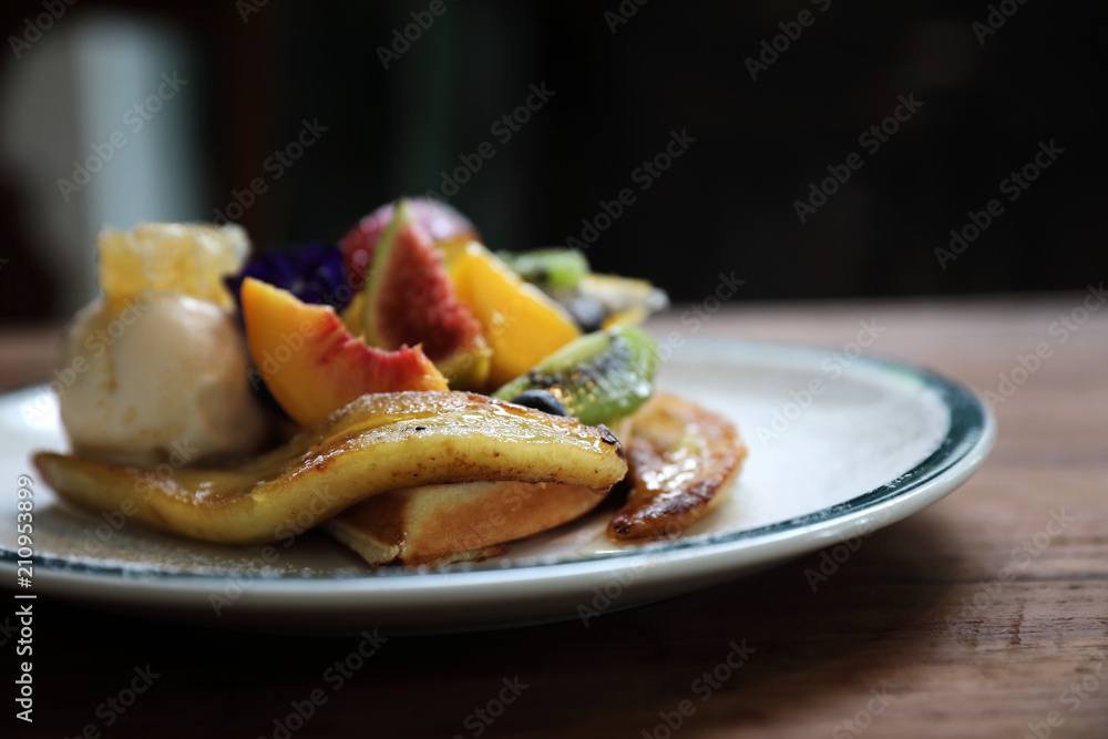 Dessert baked Waffle with fruits kiwo grape berry and vanilla ice cream vintage style Dessert baked Waffle with fruits kiwo grape berry and vanilla ice cream vintage style