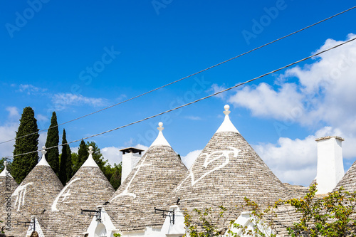 Symbols painted on the roofs of the trulli, Alberobello, Apulia, Italy
