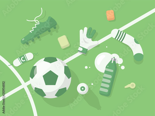 Football / Soccer Background With Sport Equipment. Monochrome Green Illuminated Field.