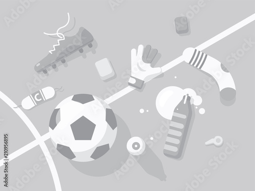 Football / Soccer Background With Sport Equipment. Monochrome Gray Illuminated Field.