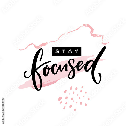 Stay focused inscription. Motivational quote, handwritten calligraphy and embossed tape text on abstract pink brush strokes. Poster print design.