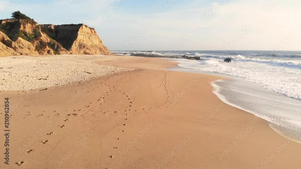 Aerial view of beautiful beach and waves in the ocean Aerial view of beautiful beach and waves in the ocean