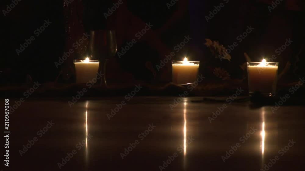 Zoom-in: Four Candles on the Floor of Venice Beach Zoom-in: Four Candles on the Floor of Venice Beach
