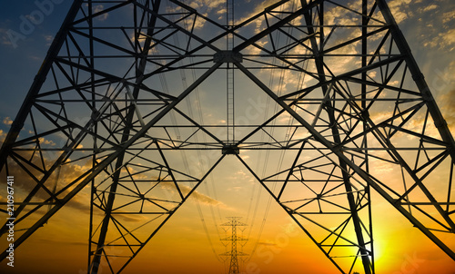 High voltage electrical pole for electricity with sky sunset background