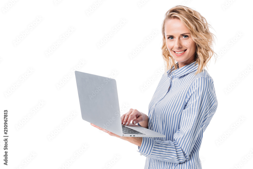 Fototapeta premium attractive woman holding laptop isolated on white