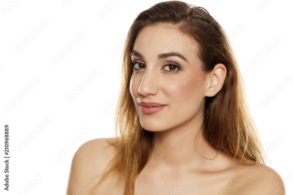 Young beautiful woman with makeup om white background Young beautiful woman with makeup om white background