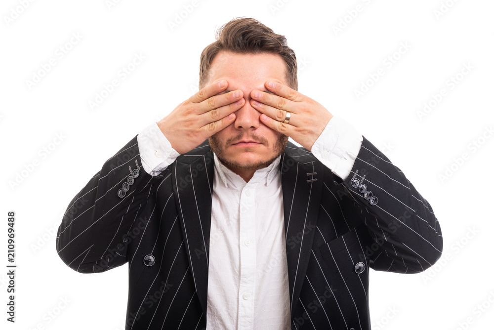 Portrait of business man covering eyes like blind concept. Portrait of business man covering eyes like blind concept.