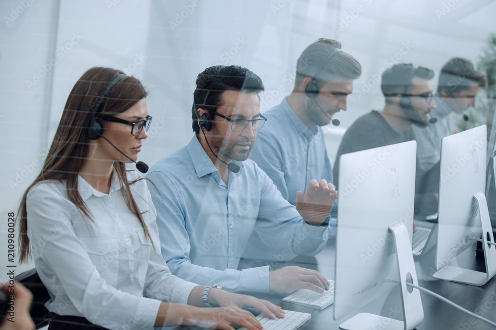 call center staff at the workplace in the office call center staff at the workplace in the office