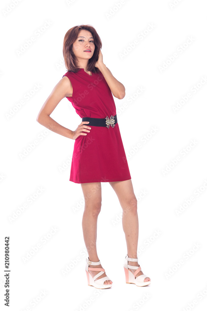 beautiful asian girl in red dress in a studio shot on white background (with selective focus) beautiful asian girl in red dress in a studio shot on white background (with selective focus)