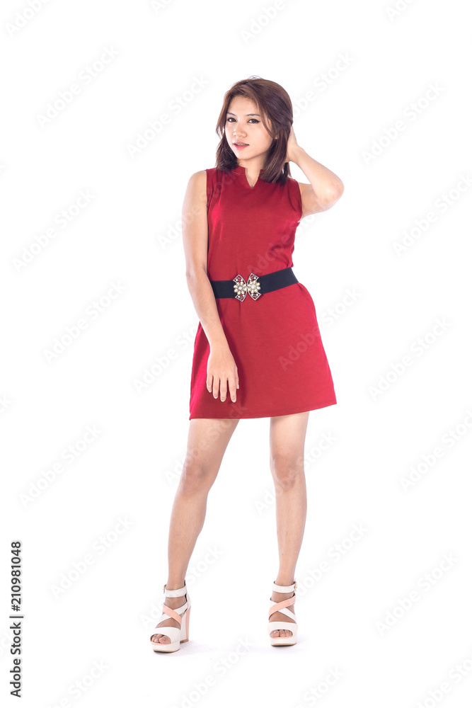 beautiful asian girl in red dress in a studio shot on white background (with selective focus) beautiful asian girl in red dress in a studio shot on white background (with selective focus)