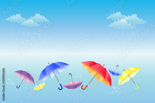 Bunte Regenschirme im Himmel