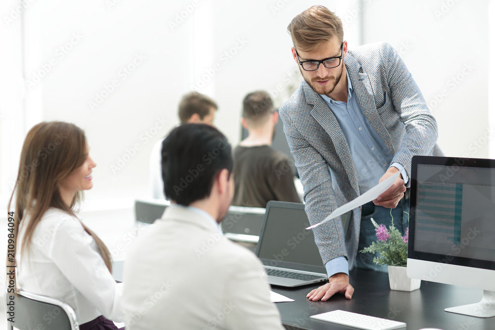 businessman discussing with the staff working document