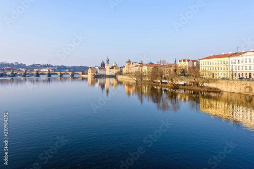 Vltava River, Charles Bridge and famous clocktower © frimufilms