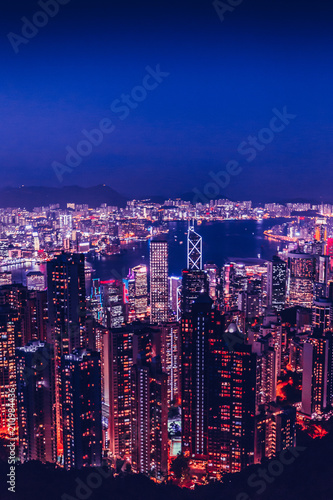 Hong Kong skyline at night from Victoria Peak with copy space in sky