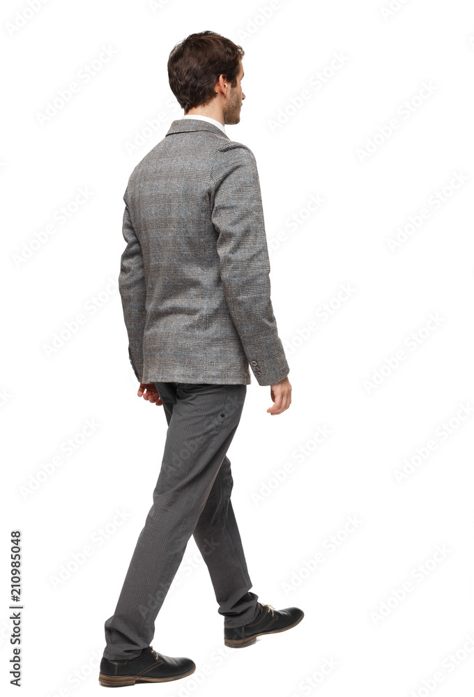 back view of walking business man. back view of walking business man.