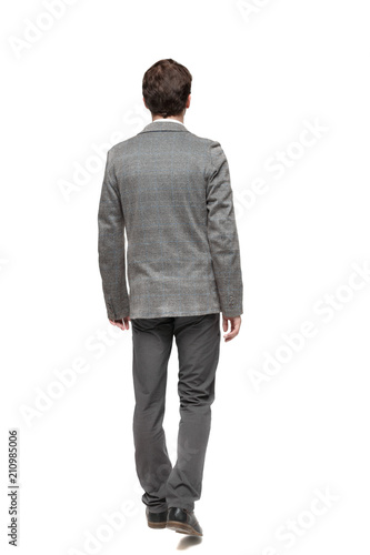 back view of walking business man. © ghoststone
