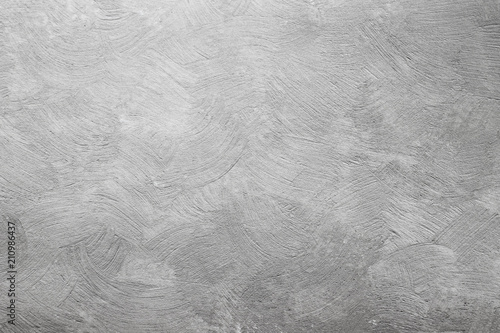 Abstract texture of decorative plaster. Grunge background of stucco texture. Gray painted surface.