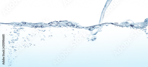 Water line surface and water jet splashing against white background